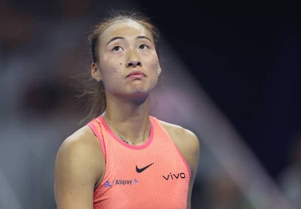 (241005) -- BEIJING, Oct. 5, 2024 -- Zheng Qinwen reacts during the women s singles semifinal match between Zheng Qinwen of China and Karolina Muchova of the Czech Republic at 2024 China Open tennis tournament in Beijing, capital of China, Oct. 5, 2024. ) (SP)CHINA-BEIJING-TENNIS-CHINA OPEN-WOMEN S SINGLES(CN) BaixXuefei 