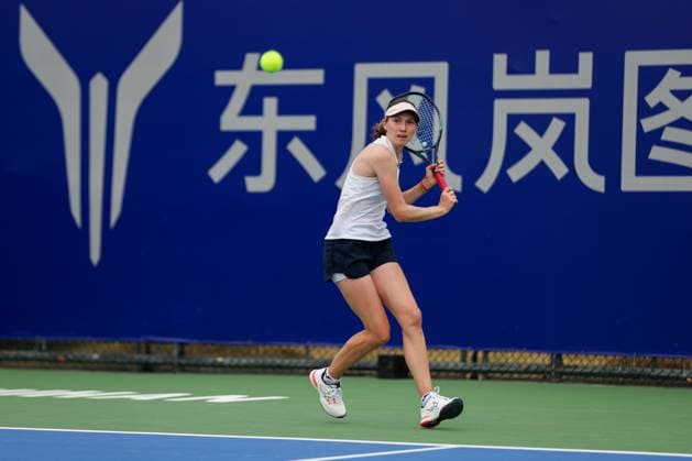 WUHAN, CHINA - OCTOBER 06: Cristina Bucsa of Spain competes in the Women s Singles Qualifying second round match against Clara Burel of France on day two of 2024 Wuhan Open at Optics Valley International Tennis Center on October 6, 2024 in Wuhan, Hubei Province of China.  Copyright: xVCGx 111522173259