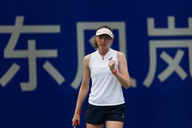 WUHAN, CHINA - OCTOBER 06: Cristina Bucsa of Spain in action in the Women s Singles Qualifying second round match against Clara Burel of France on day two of 2024 Wuhan Open at Optics Valley International Tennis Center on October 6, 2024 in Wuhan, Hubei Province of China.  Copyright: xVCGx 111522168527