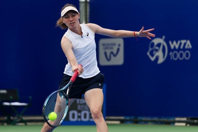 WUHAN, CHINA - OCTOBER 06: Cristina Bucsa of Spain competes in the Women s Singles Qualifying second round match against Clara Burel of France on day two of 2024 Wuhan Open at Optics Valley International Tennis Center on October 6, 2024 in Wuhan, Hubei Province of China.  Copyright: xVCGx 111522168524