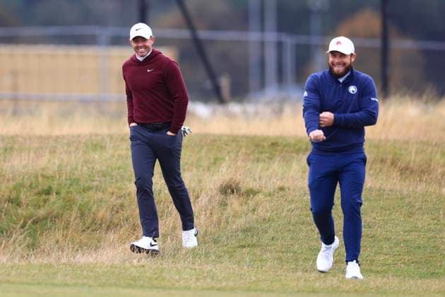 6th October 2024; The Old Course at St Andrews, Fife, Scotland; Alfred Dunhill Links Golf Championship, Final Round; Rory Mcilroy of Northern Ireland and Tyrrell Hatton of England laugh as they meet up on the Old Course, St Andrews, during the final round of the Dunhill Links Championship  ActionPlus12700849 DavidxYoung
