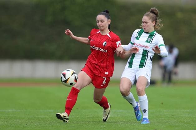 Michelle Blöchlinger SC Freiburg U20 and Suus van der Drift Borussia Mönchengladbach in a duel during the 2 Frauen Bundesliga match between Borussia Mönchengladbach and SC Freiburg, Grenzlandstadion on October 06, 2024 in Mönchengladbach, Germany Photo by Oliver Kaelke DeFodi Images Michelle Blöchlinger SC Freiburg U20 and Suus van der Drift Borussia Mönchengladbach battle for the ball during the 2 Frauen Bundesliga match between Borussia Mönchengladbach and SC Freiburg at Grenzlandstadium on October 6, 2024 in Mönchengladbach, Germany Photo by Oliver Kaelke DeFodi Images DFL regulations prohibit any use of photographs as image sequences and or quasi video Defodi 003 678 2024 10 06 OK BMGSCF 0015 Defodi-003 DFL regulations prohibit any use of photographs as image sequences and or quasi-video.