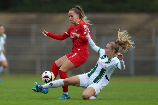 Jule Bianchi SC Freiburg U20 and Sam Drissen Borussia Mönchengladbach battle for the ball during the 2 Frauen Bundesliga match between Borussia Mönchengladbach and SC Freiburg, Grenzlandstadion on October 06, 2024 in Mönchengladbach, Germany Photo by Oliver Kaelke DeFodi Images Jule Bianchi SC Freiburg U20 and Sam Drissen Borussia Mönchengladbach battle for the ball during the 2 Frauen Bundesliga match between Borussia Mönchengladbach and SC Freiburg at Grenzlandstadium on October 6, 2024 in Mönchengladbach, Germany Photo by Oliver Kaelke DeFodi Images DFL regulations prohibit any use of photographs as image sequences and or quasi video Defodi 003 678 2024 10 06 OK BMGSCF 0022 Defodi-003 DFL regulations prohibit any use of photographs as image sequences and or quasi-video.