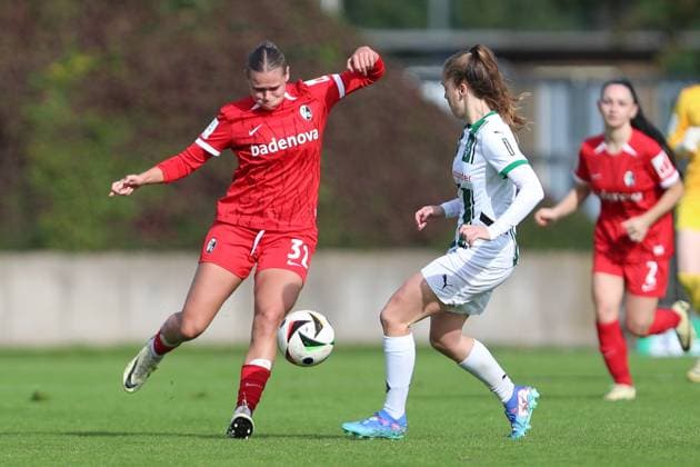 Yara Volpert SC Freiburg U20 and Suus van der Drift Borussia Mönchengladbach battle for the ball during the 2 Frauen Bundesliga match between Borussia Mönchengladbach and SC Freiburg, Grenzlandstadion on October 06, 2024 in Mönchengladbach, Germany Photo by Oliver Kaelke DeFodi Images Yara Volpert SC Freiburg U20 and Suus van der Drift Borussia Mönchengladbach battle for the ball during the 2 Frauen Bundesliga match between Borussia Mönchengladbach and SC Freiburg at Grenzlandstadium on October 6, 2024 in Mönchengladbach, Germany Photo by Oliver Kaelke DeFodi Images DFL regulations prohibit any use of photographs as image sequences and or quasi video Defodi 003 678 2024 10 06 OK BMGSCF 0701 Defodi-003 DFL regulations prohibit any use of photographs as image sequences and or quasi-video.
