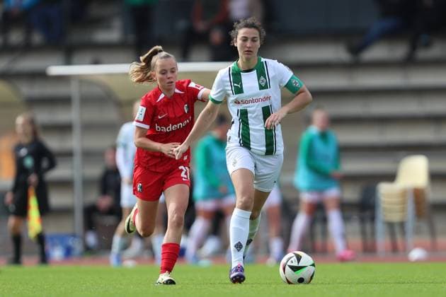 Mia Scholle SC Freiburg U20 and Kristina Bartsch Borussia Mönchengladbach battle for the ball during the 2 Frauen Bundesliga match between Borussia Mönchengladbach and SC Freiburg, Grenzlandstadion on October 06, 2024 in Mönchengladbach, Germany Photo by Oliver Kaelke DeFodi Images Mia Scholle SC Freiburg U20 and Kristina Bartsch Borussia Mönchengladbach battle for the ball during the 2 Frauen Bundesliga match between Borussia Mönchengladbach and SC Freiburg at Grenzlandstadium on October 6, 2024 in Mönchengladbach, Germany Photo by Oliver Kaelke DeFodi Images DFL regulations prohibit any use of photographs as image sequences and or quasi video Defodi 003 678 2024 10 06 OK BMGSCF 0856 Defodi-003 DFL regulations prohibit any use of photographs as image sequences and or quasi-video.