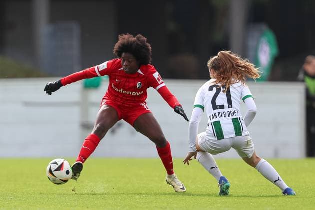 Nailatou Sadikou SC Freiburg U20 and Suus van der Drift Borussia Mönchengladbach battle for the ball during the 2 Frauen Bundesliga match between Borussia Mönchengladbach and SC Freiburg, Grenzlandstadion on October 06, 2024 in Mönchengladbach, Germany Photo by Oliver Kaelke DeFodi Images Nailatou Sadikou SC Freiburg U20 and Suus van der Drift Borussia Mönchengladbach battle for the ball during the 2 Frauen Bundesliga match between Borussia Mönchengladbach and SC Freiburg at Grenzlandstadium on October 6, 2024 in Mönchengladbach, Germany Photo by Oliver Kaelke DeFodi Images DFL regulations prohibit any use of photographs as image sequences and or quasi video Defodi 003 678 2024 10 06 OK BMGSCF 0860 Defodi-003 DFL regulations prohibit any use of photographs as image sequences and or quasi-video.