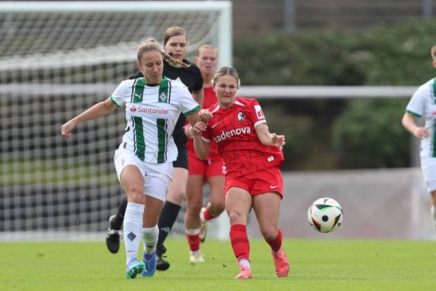 Yvonne Zielinski Borussia Mönchengladbach and Noreen Günnewig SC Freiburg U20 in a duel during the 2 Frauen Bundesliga match between Borussia Mönchengladbach and SC Freiburg, Grenzlandstadion on October 06, 2024 in Mönchengladbach, Germany Photo by Oliver Kaelke DeFodi Images Yvonne Zielinski Borussia Mönchengladbach and Noreen Günnewig SC Freiburg U20 in a duel during the 2 Frauen Bundesliga match between Borussia Mönchengladbach and SC Freiburg at Grenzlandstadium on October 6, 2024 in Mönchengladbach, Germany Photo by Oliver Kaelke DeFodi Images DFL regulations prohibit any use of photographs as image sequences and or quasi video Defodi 003 678 2024 10 06 OK BMGSCF 0905 Defodi-003 DFL regulations prohibit any use of photographs as image sequences and or quasi-video.