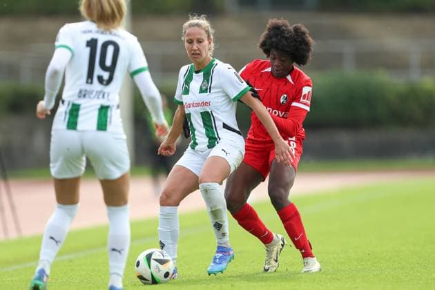 Yvonne Zielinski Borussia Mönchengladbach and Nailatou Sadikou SC Freiburg U20 battle for the ball during the 2 Frauen Bundesliga match between Borussia Mönchengladbach and SC Freiburg, Grenzlandstadion on October 06, 2024 in Mönchengladbach, Germany Photo by Oliver Kaelke DeFodi Images Yvonne Zielinski Borussia Mönchengladbach and Nailatou Sadikou SC Freiburg U20 battle for the ball during the 2 Frauen Bundesliga match between Borussia Mönchengladbach and SC Freiburg at Grenzlandstadium on October 6, 2024 in Mönchengladbach, Germany Photo by Oliver Kaelke DeFodi Images DFL regulations prohibit any use of photographs as image sequences and or quasi video Defodi 003 678 2024 10 06 OK BMGSCF 1023 Defodi-003 DFL regulations prohibit any use of photographs as image sequences and or quasi-video.