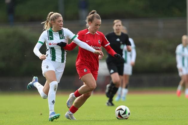 Yvonne Brietzke Borussia Mönchengladbach and Nora Scherer SC Freiburg U20 battle for the ball during the 2 Frauen Bundesliga match between Borussia Mönchengladbach and SC Freiburg, Grenzlandstadion on October 06, 2024 in Mönchengladbach, Germany Photo by Oliver Kaelke DeFodi Images Yvonne Brietzke Borussia Mönchengladbach and Nora Scherer SC Freiburg U20 battle for the ball during the 2 Frauen Bundesliga match between Borussia Mönchengladbach and SC Freiburg at Grenzlandstadium on October 6, 2024 in Mönchengladbach, Germany Photo by Oliver Kaelke DeFodi Images DFL regulations prohibit any use of photographs as image sequences and or quasi video Defodi 003 678 2024 10 06 OK BMGSCF 1070 Defodi-003 DFL regulations prohibit any use of photographs as image sequences and or quasi-video.