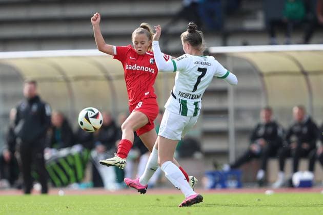 Mia Scholle SC Freiburg U20 and Emily Tichelkamp Borussia Mönchengladbach battle for the ball during the 2 Frauen Bundesliga match between Borussia Mönchengladbach and SC Freiburg, Grenzlandstadion on October 06, 2024 in Mönchengladbach, Germany Photo by Oliver Kaelke DeFodi Images Mia Scholle SC Freiburg U20 and Emily Tichelkamp Borussia Mönchengladbach battle for the ball during the 2 Frauen Bundesliga match between Borussia Mönchengladbach and SC Freiburg at Grenzlandstadium on October 6, 2024 in Mönchengladbach, Germany Photo by Oliver Kaelke DeFodi Images DFL regulations prohibit any use of photographs as image sequences and or quasi video Defodi 003 678 2024 10 06 OK BMGSCF 1348 Defodi-003 DFL regulations prohibit any use of photographs as image sequences and or quasi-video.