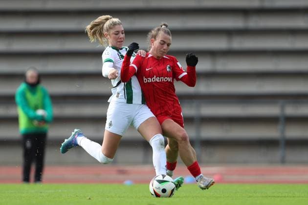 Yvonne Brietzke Borussia Mönchengladbach and Nora Scherer SC Freiburg U20 battle for the ball during the 2 Frauen Bundesliga match between Borussia Mönchengladbach and SC Freiburg, Grenzlandstadion on October 06, 2024 in Mönchengladbach, Germany Photo by Oliver Kaelke DeFodi Images Yvonne Brietzke Borussia Mönchengladbach and Nora Scherer SC Freiburg U20 battle for the ball during the 2 Frauen Bundesliga match between Borussia Mönchengladbach and SC Freiburg at Grenzlandstadium on October 6, 2024 in Mönchengladbach, Germany Photo by Oliver Kaelke DeFodi Images DFL regulations prohibit any use of photographs as image sequences and or quasi video Defodi 003 678 2024 10 06 OK BMGSCF 1126 Defodi-003 DFL regulations prohibit any use of photographs as image sequences and or quasi-video.