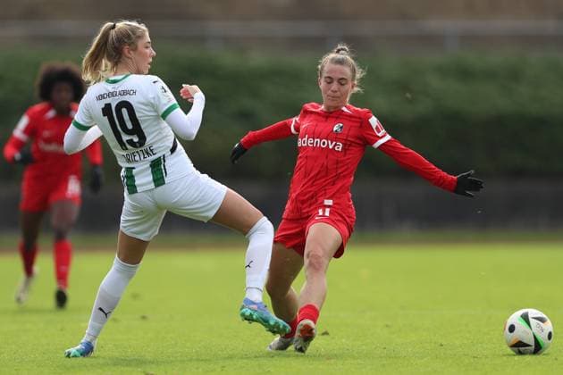 Yvonne Brietzke Borussia Mönchengladbach and Nora Scherer SC Freiburg U20 battle for the ball during the 2 Frauen Bundesliga match between Borussia Mönchengladbach and SC Freiburg, Grenzlandstadion on October 06, 2024 in Mönchengladbach, Germany Photo by Oliver Kaelke DeFodi Images Yvonne Brietzke Borussia Mönchengladbach and Nora Scherer SC Freiburg U20 battle for the ball during the 2 Frauen Bundesliga match between Borussia Mönchengladbach and SC Freiburg at Grenzlandstadium on October 6, 2024 in Mönchengladbach, Germany Photo by Oliver Kaelke DeFodi Images DFL regulations prohibit any use of photographs as image sequences and or quasi video Defodi 003 678 2024 10 06 OK BMGSCF 1223 Defodi-003 DFL regulations prohibit any use of photographs as image sequences and or quasi-video.