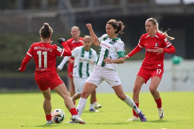 Nora Scherer SC Freiburg U20 , Kristina Bartsch Borussia Mönchengladbach and Weena Simmen SC Freiburg U20 battle for the ball during the 2 Frauen Bundesliga match between Borussia Mönchengladbach and SC Freiburg at Grenzlandstadium on October 06, 2024 in Mönchengladbach, Germany Photo by Oliver Kaelke DeFodi Images Nora Scherer SC Freiburg U20 , Kristina Bartsch Borussia Mönchengladbach and Weena Simmen SC Freiburg U20 battle for the ball during the 2 Frauen Bundesliga match between Borussia Mönchengladbach and SC Freiburg at Grenzlandstadium on October 6, 2024 in Mönchengladbach, Germany Photo by Oliver Kaelke DeFodi Images DFL regulations prohibit any use of photographs as image sequences and or quasi video Defodi 003 678 2024 10 06 OK BMGSCF 1376 Defodi-003 DFL regulations prohibit any use of photographs as image sequences and or quasi-video.
