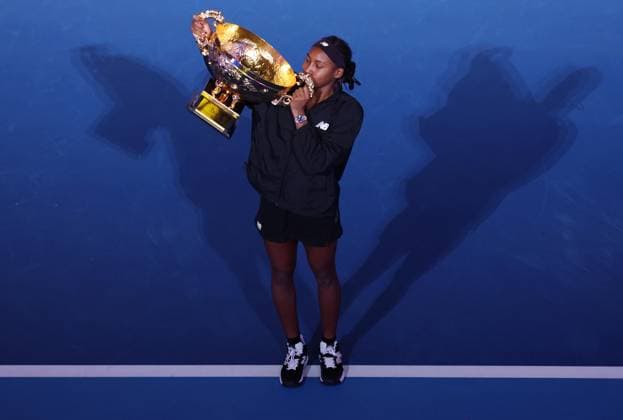 (241006) -- BEIJING, Oct. 6, 2024 -- Winner Coco Gauff of the United States kisses her trophy after winning the women s singles final match against Karolina Muchova of the Czech Republic at the 2024 China Open tennis tournament in Beijing, China, Oct. 6, 2024. ) (SP)CHINA-BEIJING-TENNIS-CHINA OPEN-WOMEN S SINGLES-FINAL (CN) ZhangxChenlin 