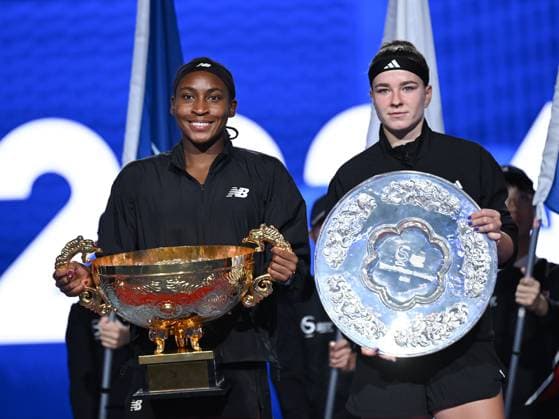 (241006) -- BEIJING, Oct. 6, 2024 -- Winner Coco Gauff (L) of the United States and runner-up Karolina Muchova of the Czech Republic pose during the awarding ceremony for the women s singles event at the 2024 China Open tennis tournament in Beijing, China, Oct. 6, 2024. ) (SP)CHINA-BEIJING-TENNIS-CHINA OPEN-WOMEN S SINGLES-FINAL (CN) ZhangxLong 