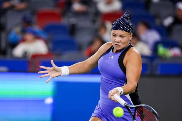 WUHAN, CHINA - OCTOBER 07: Diana Shnaider of Russia competes in the Women s Singles Round of 64 match against Leylah Fernandez of Canada on day three of 2024 Wuhan Open at Optics Valley International Tennis Center on October 7, 2024 in Wuhan, Hubei Province of China.  Copyright: xVCGx 111522353383