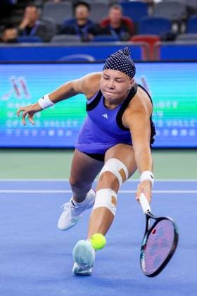 WUHAN, CHINA - OCTOBER 07: Diana Shnaider of Russia competes in the Women s Singles Round of 64 match against Leylah Fernandez of Canada on day three of 2024 Wuhan Open at Optics Valley International Tennis Center on October 7, 2024 in Wuhan, Hubei Province of China.  Copyright: xVCGx 111522353382