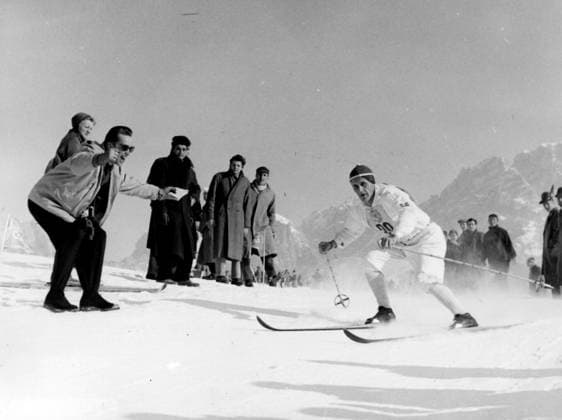ITALY CORTINA 1956. ORIGIN. CAPTION... THE OLYMPICS IN CORTINA. SIXTEN JERNBERG ON THE WAY TO THE GOLD IN THE 50 KM CHEERS ON BY THE GOLD MAN SIGGE ERIKSSON. Note BILDARKIVETS CATALOG NR43.10 Winter Olympics Spectator S Jernberg, Swedish skier, won several medals in the 1956 Olympics S Eriksson, Swedish speed skater, gold medalist in the 1956 Olympics v01a Sports chronicle of the century - part II broadcast on SVT1 2000-01-06 persons: SIXTEN JERNBERG; SIGVARD SIGGE ERIKSSON sites: CORTINA; ITALY; SWEDEN* Cortina Italy OS sp_sw x5600x *** ITALY CORTINA 1956 ORIGIN CAPTION THE OLYMPICS IN CORTINA SIXTEN JERNBERG ON THE WAY TO THE GOLD IN THE 50 KM CHEERS ON BY THE GOLD MAN SIGGE ERIKSSON Note BILDARKIVETS CATALOG NR43 10 Winter Olympics Spectator S Jernberg, Swedish skier, won several medals in the 1956 Olympics S Eriksson, Swedish speed skater, gold medalist in the 1956 Olympics v01a Sports chronicle of the century part II broadcast on SVT1 2000 01 06 persons SIXTEN JERNBERG SIGVARD SIGGE ERIKSSON sites CORTINA ITALY SWEDEN Cortina Italy OS sp sw x5600x  Copyright: xXxXxXx WINTER OLYMPICS IN CORTINA 1956