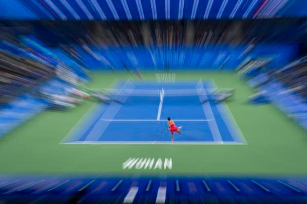 (241007) -- WUHAN, Oct. 7, 2024 -- Yuan Yue of China hits a return during the women s singles round of 64 match against Clara Burel of France at the 2024 Wuhan Open tennis tournament in Wuhan, capital of central China s Hubei Province, Oct. 7, 2024. ) (SP)CHINA-WUHAN-TENNIS-WUHAN OPEN-WOMEN S SINGLES (CN) WuxZhizun 