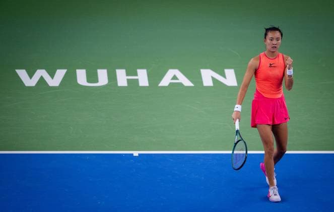 (241007) -- WUHAN, Oct. 7, 2024 -- Yuan Yue of China celebrates a score during the women s singles round of 64 match against Clara Burel of France at the 2024 Wuhan Open tennis tournament in Wuhan, capital of central China s Hubei Province, Oct. 7, 2024. ) (SP)CHINA-WUHAN-TENNIS-WUHAN OPEN-WOMEN S SINGLES (CN) HuxJingwen 