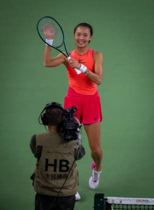 (241007) -- WUHAN, Oct. 7, 2024 -- Yuan Yue of China celebrates after winning the women s singles round of 64 match against Clara Burel of France at the 2024 Wuhan Open tennis tournament in Wuhan, capital of central China s Hubei Province, Oct. 7, 2024. ) (SP)CHINA-WUHAN-TENNIS-WUHAN OPEN-WOMEN S SINGLES (CN) HuxJingwen 