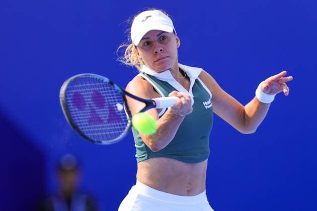 WUHAN, CHINA - OCTOBER 08: Magda Linette of Poland competes in the Women s Singles Round of 64 match against Liudmila Samsonova of Russia on day four of 2024 Wuhan Open at Optics Valley International Tennis Center on October 8, 2024 in Wuhan, Hubei Province of China.  Copyright: xVCGx 111522550237