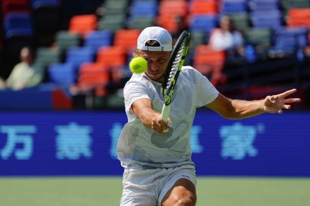 (241008) -- SHANGHAI, Oct. 8, 2024 -- Alexandre Muller hits a return during the men s singles round of 32 match between Stefanos Tsitsipas of Greece and Alexandre Muller of France at the ATP, Tennis Herren World Tour Shanghai Masters tennis tournament in Shanghai, east China, Oct. 8, 2024. ) (SP)CHINA-SHANGHAI-TENNIS-ATP TOUR-SHANGHAI MASTERS(CN) XuxYanan 