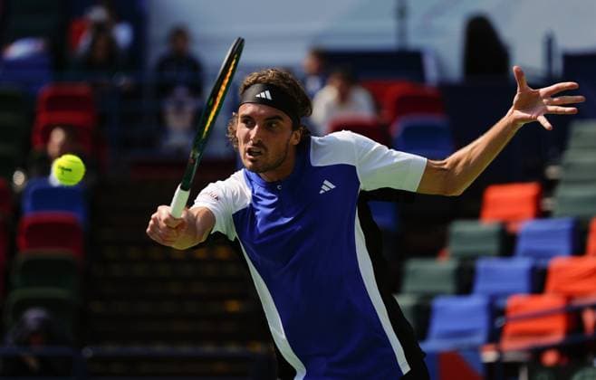 (241008) -- SHANGHAI, Oct. 8, 2024 -- Stefanos Tsitsipas hits a return during the men s singles round of 32 match between Stefanos Tsitsipas of Greece and Alexandre Muller of France at the ATP, Tennis Herren World Tour Shanghai Masters tennis tournament in Shanghai, east China, Oct. 8, 2024. ) (SP)CHINA-SHANGHAI-TENNIS-ATP TOUR-SHANGHAI MASTERS(CN) XuxYanan 