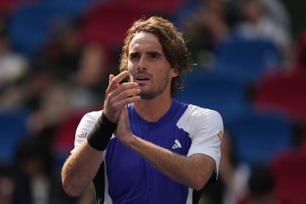 (241008) -- SHANGHAI, Oct. 8, 2024 -- Stefanos Tsitsipas celebrates after the men s singles round of 32 match between Stefanos Tsitsipas of Greece and Alexandre Muller of France at the ATP, Tennis Herren World Tour Shanghai Masters tennis tournament in Shanghai, east China, Oct. 8, 2024. ) (SP)CHINA-SHANGHAI-TENNIS-ATP TOUR-SHANGHAI MASTERS(CN) XuxYanan 