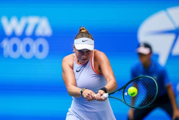 WUHAN, CHINA - OCTOBER 08: Amanda Anisimova of United States competes in the Women s Singles Round of 64 match against Cristina Bucsa of Spain on day four of 2024 Wuhan Open at Optics Valley International Tennis Center on October 8, 2024 in Wuhan, Hubei Province of China.  Copyright: xVCGx 111522571718