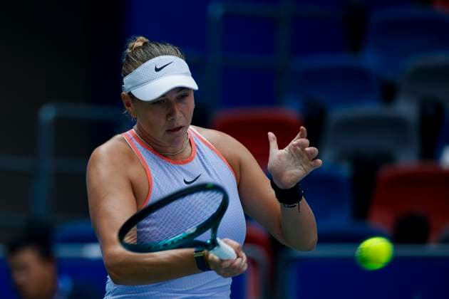 WUHAN, CHINA - OCTOBER 08: Amanda Anisimova of United States competes in the Women s Singles Round of 64 match against Cristina Bucsa of Spain on day four of 2024 Wuhan Open at Optics Valley International Tennis Center on October 8, 2024 in Wuhan, Hubei Province of China.  Copyright: xVCGx 111522566579
