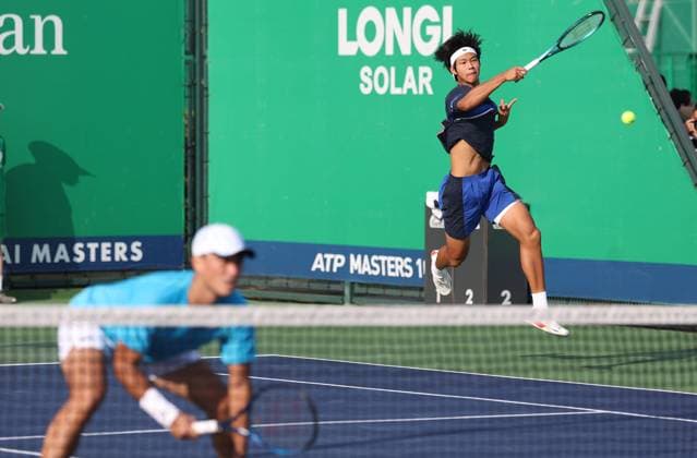 (241008) -- SHANGHAI, Oct. 8, 2024 -- Wang Aoran and Zhou Yi (R) compete during the men s doubles round of 32 match between Zhou Yi Wang Aoran of China and Sadio Doumbia Fabien Reboul of France at the ATP, Tennis Herren World Tour Shanghai Masters tennis tournament in Shanghai, east China, Oct. 8, 2024. ) (SP)CHINA-SHANGHAI-TENNIS-ATP TOUR-SHANGHAI MASTERS(CN) BaixXuefei 