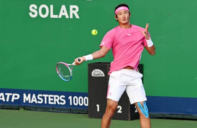 SHANGHAI, CHINA - OCTOBER 08: Zhang Zhizhen of China and Tomas Machac (not in the picture) of Czechia compete in the Men s Doubles Round of 32 match against Simone Bolelli of Italy and Andrea Vavassori of Italy on Day 9 of 2024 Shanghai Rolex Masters at Qi Zhong Tennis Centre on October 8, 2024 in Shanghai, China.  Copyright: xZhangxHaohaox 111522597203