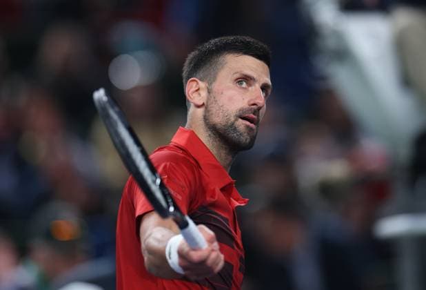 (241008) -- SHANGHAI, Oct. 8, 2024 -- Novak Djokovic reacts during the men s singles round of 32 match between Novak Djokovic of Serbia and Flavio Cobolli of Italy at the ATP, Tennis Herren World Tour Shanghai Masters tennis tournament in Shanghai, east China, Oct. 8, 2024. ) (SP)CHINA-SHANGHAI-TENNIS-ATP TOUR-SHANGHAI MASTERS(CN) BaixXuefei 