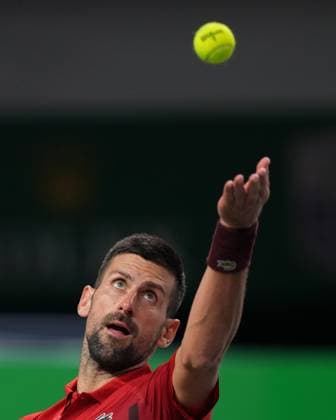 (241008) -- SHANGHAI, Oct. 8, 2024 -- Novak Djokovic serves during the men s singles round of 32 match between Novak Djokovic of Serbia and Flavio Cobolli of Italy at the ATP, Tennis Herren World Tour Shanghai Masters tennis tournament in Shanghai, east China, Oct. 8, 2024. ) (SP)CHINA-SHANGHAI-TENNIS-ATP TOUR-SHANGHAI MASTERS(CN) XuxYanan 