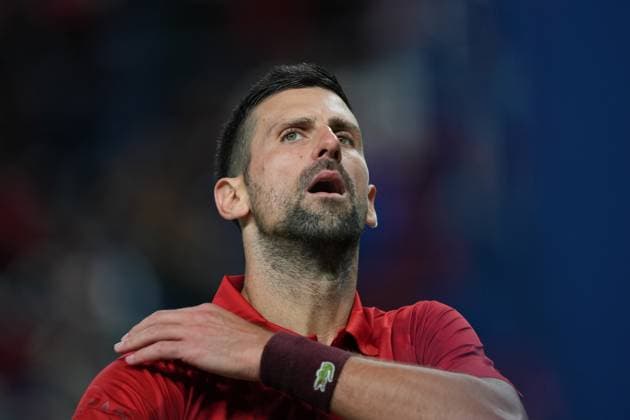 (241008) -- SHANGHAI, Oct. 8, 2024 -- Novak Djokovic reacts during the men s singles round of 32 match between Novak Djokovic of Serbia and Flavio Cobolli of Italy at the ATP, Tennis Herren World Tour Shanghai Masters tennis tournament in Shanghai, east China, Oct. 8, 2024. ) (SP)CHINA-SHANGHAI-TENNIS-ATP TOUR-SHANGHAI MASTERS(CN) XuxYanan 