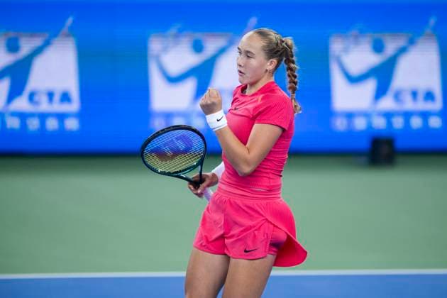 (241008) -- WUHAN, Oct. 8, 2024 -- Andreeva Mirra of Russia celebrates during the women s singles round of 64 match against Wang Xiyu of China at the 2024 Wuhan Open tennis tournament in Wuhan, capital of central China s Hubei Province, Oct. 8, 2024. ) (SP)CHINA-WUHAN-TENNIS-WUHAN OPEN-WOMEN S SINGLES (CN) WuxZhizun 