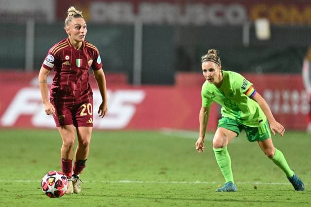 8th October 2024; Stadio Tre Fontane, Rome, Italy; UEFA Womens Champions League Football, Roma versus Wolsburg; Giada Greggi of AS Roma moves away from the pressure from Svenja Huth of Wolfsburg  ActionPlus12701620 AllShotLive