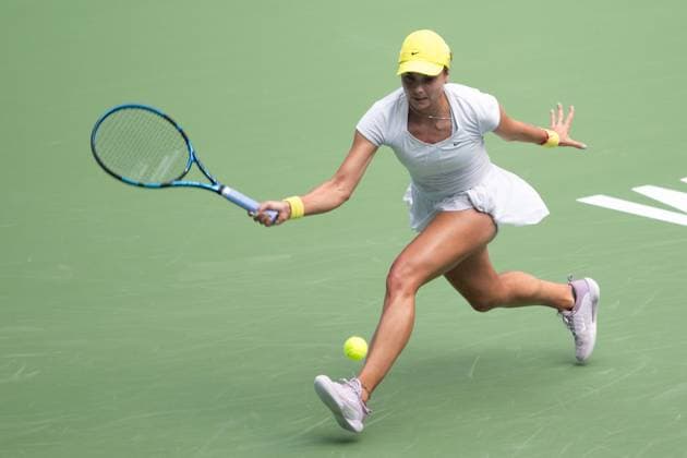 (241009) -- WUHAN, Oct. 9, 2024 -- Viktoriya Tomova of Bulgaria hits a return during the women s singles round of 32 match against Coco Gauff of the United States at the 2024 Wuhan Open tennis tournament in Wuhan, capital of central China s Hubei Province, Oct. 9, 2024. ) (SP)CHINA-WUHAN-TENNIS-WUHAN OPEN-WOMEN S SINGLES (CN) XiaoxYijiu 