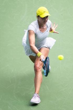 (241009) -- WUHAN, Oct. 9, 2024 -- Viktoriya Tomova of Bulgaria hits a return during the women s singles round of 32 match against Coco Gauff of the United States at the 2024 Wuhan Open tennis tournament in Wuhan, capital of central China s Hubei Province, Oct. 9, 2024. ) (SP)CHINA-WUHAN-TENNIS-WUHAN OPEN-WOMEN S SINGLES (CN) XiaoxYijiu 