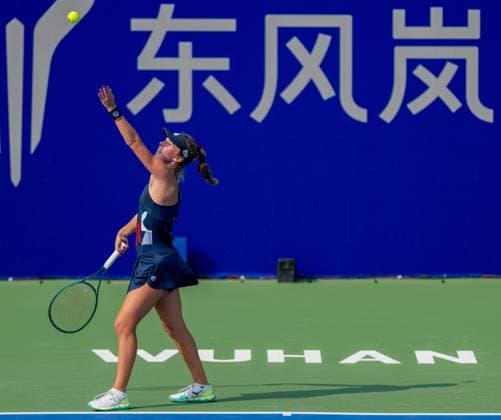 (241009) -- WUHAN, Oct. 9, 2024 -- Magdalena Frech serves during the women s singles round of 32 match between Magdalena Frech of Poland and Emma Navarro of the United States at the 2024 Wuhan Open tennis tournament in Wuhan, capital of central China s Hubei Province, Oct. 9, 2024. ) (SP)CHINA-WUHAN-TENNIS-WUHAN OPEN-WOMEN S SINGLES(CN) HuxJingwen 