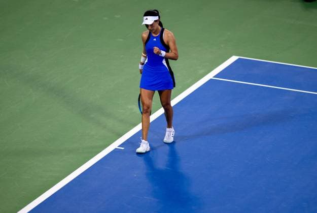 (241009) -- WUHAN, Oct. 9, 2024 -- Wang Xinyu celebrates scoring during the women s singles round of 32 match between Wang Xinyu of China and Lucia Bronzetti of Italy at the 2024 Wuhan Open tennis tournament in Wuhan, capital of central China s Hubei Province, Oct. 9, 2024. ) (SP)CHINA-WUHAN-TENNIS-WUHAN OPEN-WOMEN S SINGLES(CN) HuxJingwen 
