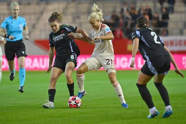 Pernile HARDER FCB , action,duel against Lia WAELTI ARS,right and Marion CALDENTEY ARS,left , FC Bayern Muenchen FC Arsenal Womens Champions League on 09 10 2024 FC BAYERN CAMPUS