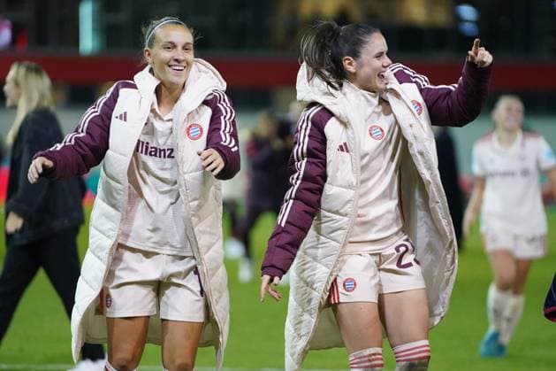 Julia Zigiotti Olme 16 Bayern and Sarah Zadrazil 25 FC Bayern celebrate with the fans after the UEFA Womens Champions League match FC Bayern Munich Arsenal Women Football Club on 09 10 2024