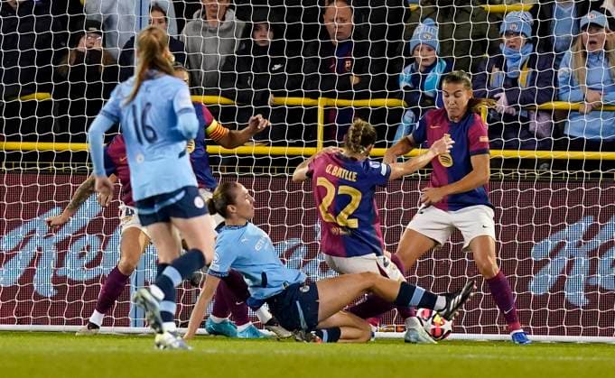 Manchester, England, 9th October 2024. Naomi Layzell of Manchester City (C) scores the opening goal during the UEFA Womens Champions League match at the Academy Stadium, Manchester. Picture credit should read: Andrew Yates Sportimage EDITORIAL USE ONLY. No use with unauthorised audio, video, data, fixture lists, club league logos or live services. Online in-match use limited to 120 images, no video emulation. No use in betting, games or single club league player publications. SPI-3368-0002