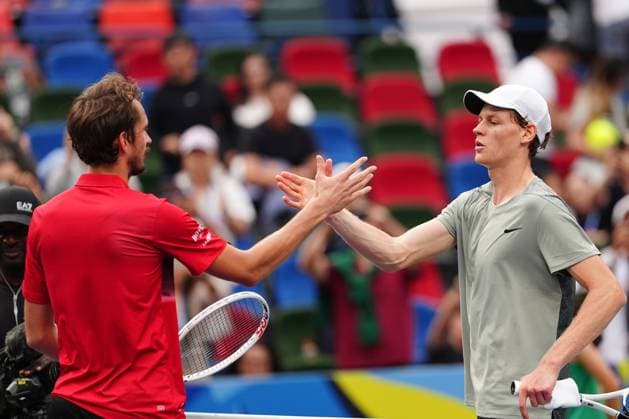 (241010) -- SHANGHAI, Oct. 10, 2024 -- Daniil Medvedev and Jannik Sinner (R) greet each other after the men s singles quarterfinal match between Jannik Sinner of Italy and Daniil Medvedev of Russia at the ATP, Tennis Herren World Tour Shanghai Masters tennis tournament in Shanghai, east China, Oct. 10, 2024. ) (SP)CHINA-SHANGHAI-TENNIS-ATP TOUR-SHANGHAI MASTERS(CN) XuxYanan 