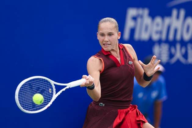 WUHAN, CHINA - OCTOBER 10: Erika Andreeva of Russia competes in the Women s Singles Round of 16 match against Jasmine Paolini of Italy on day five of 2024 Wuhan Open at Optics Valley International Tennis Center on October 10, 2024 in Wuhan, Hubei Province of China.  Copyright: xVCGx 111522981511