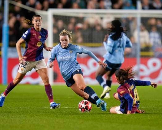 9th October 2024; Joie Stadium, Manchester, England; UEFA Womens Champions League Football, Manchester City versus Barcelona; Lauren Hemp of Manchester City runs with the ball under pressure fromAitana Bonmati of Barcelona women  ActionPlus12702065 StevenxFlynn