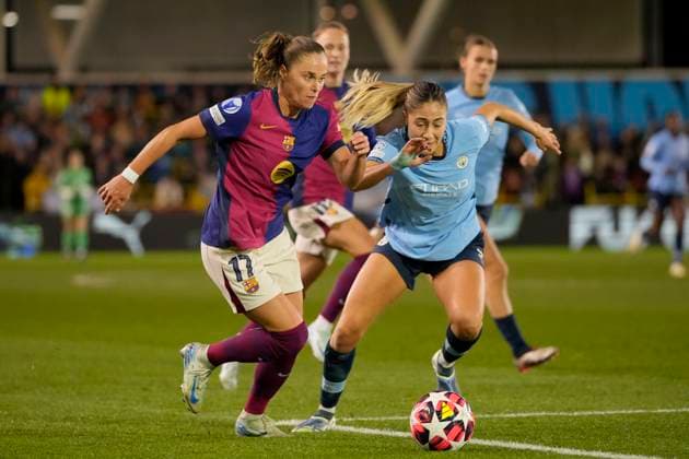 9th October 2024; Joie Stadium, Manchester, England; UEFA Womens Champions League Football, Manchester City versus Barcelona; Ewa Pajor of Barcelona women breaks past Alanna Kennedy of Manchester City  ActionPlus12702134 StevenxFlynn