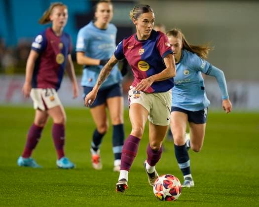 9th October 2024; Joie Stadium, Manchester, England; UEFA Womens Champions League Football, Manchester City versus Barcelona; Mapi Leon of Barcelona women breaks away from Jess Park of Manchester City  ActionPlus12702107 StevenxFlynn